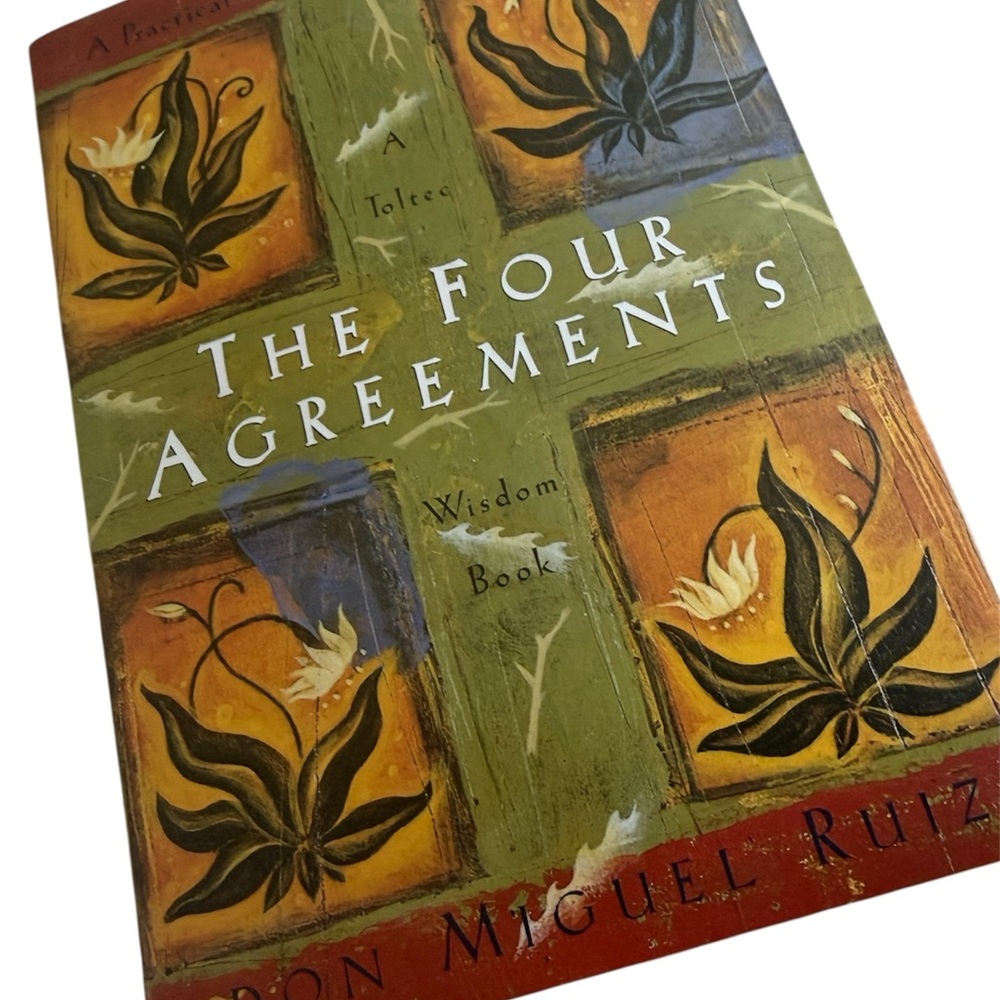 The Four Agreements Book by - Green and Brown Cover